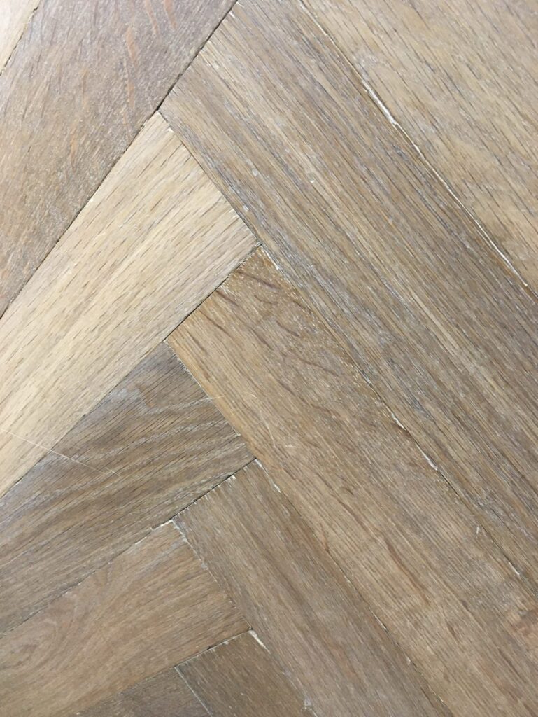 oak herringbone engineered floor rustique aged sanded smoked whitewash oiled side view