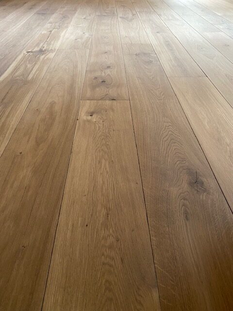 solid oak plank floor parts sanded and polished