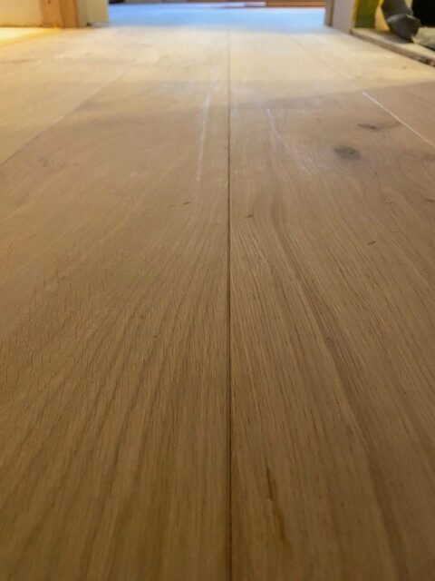 installed oak plank flooring unfinished